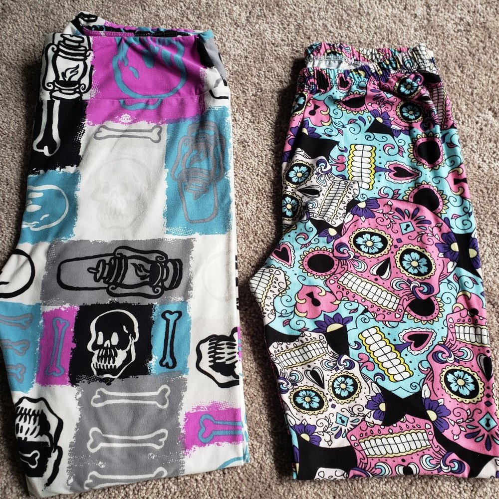 Two pairs of women's skull leggings